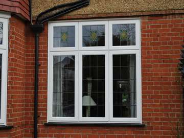 Mr D. : Hoylake Wirral : Installation of a D2800 White PvcU window glazed with 40mm triple glazed Units U value .7. Design leadlights to match existing windows
